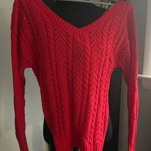 New with designer tag (no price tag) never worn v neck , knotted back sweater